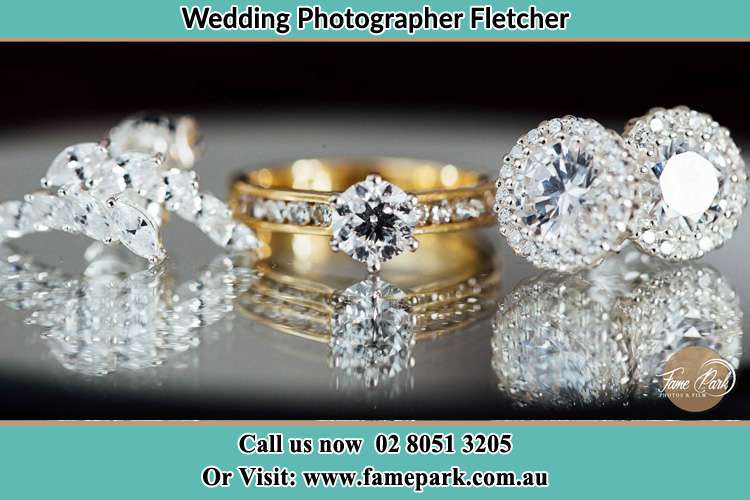 Photo of Brides engagement ring, cliff and earrings Fletcher NSW 2287